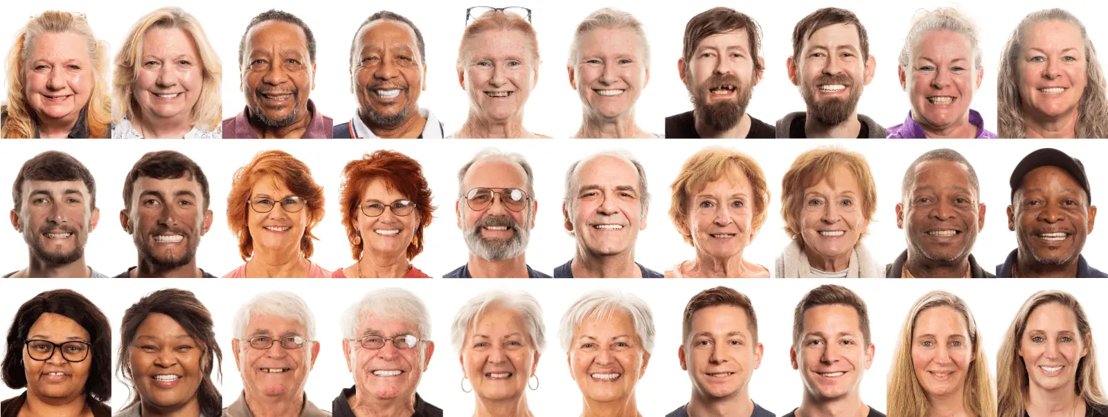 Smiling patients after full mouth dental implants Chattanooga TN